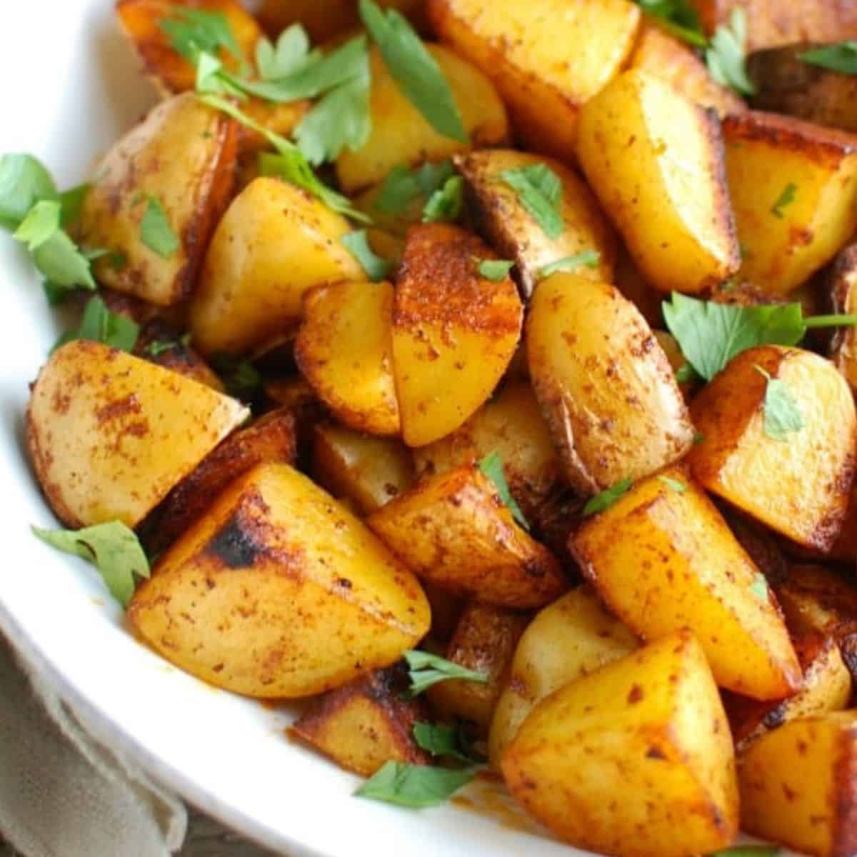 Paprika Roasted Potatoes with Spiced Yogurt Sauce