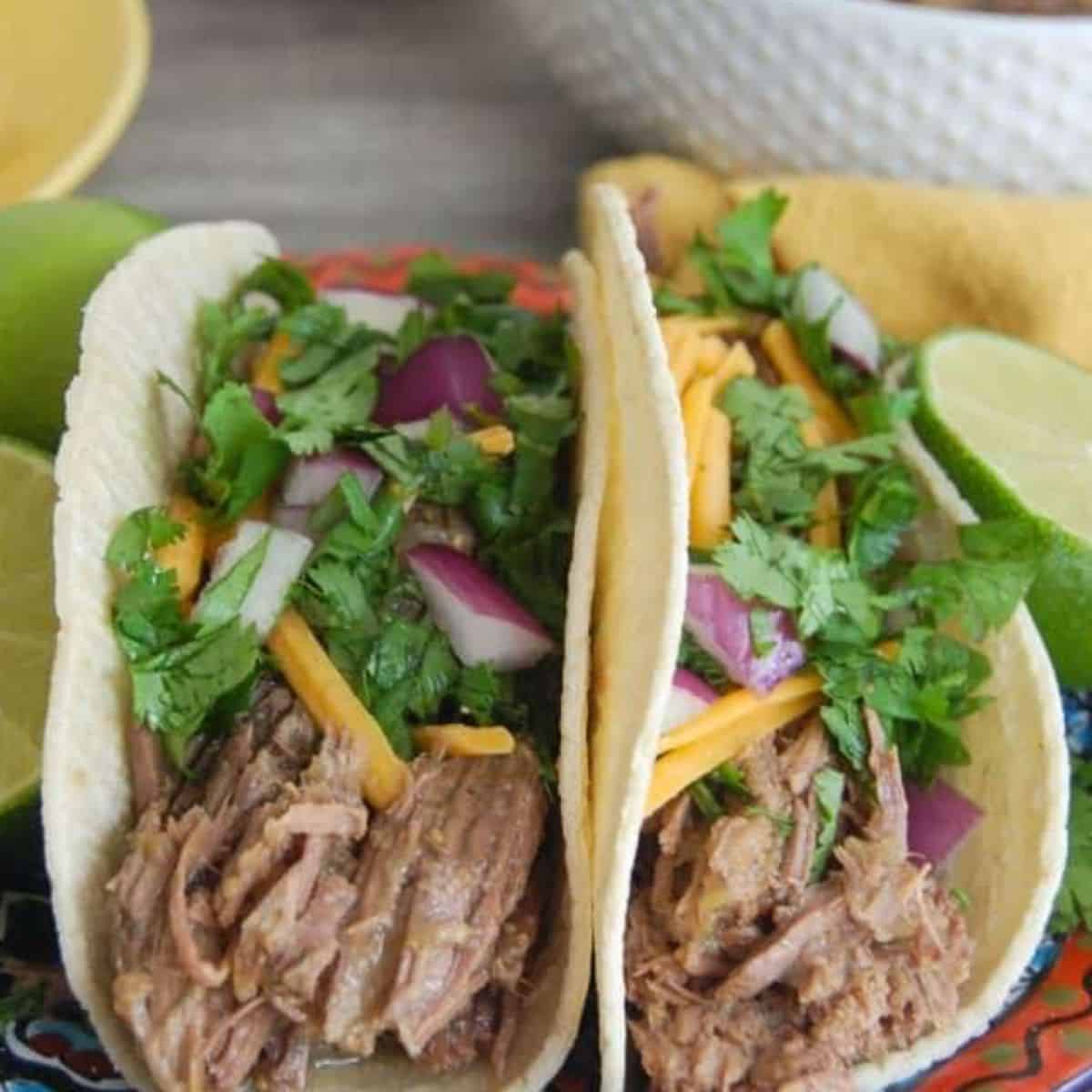 Slow Cooker Shredded Beef Tacos (4 Ingredients)