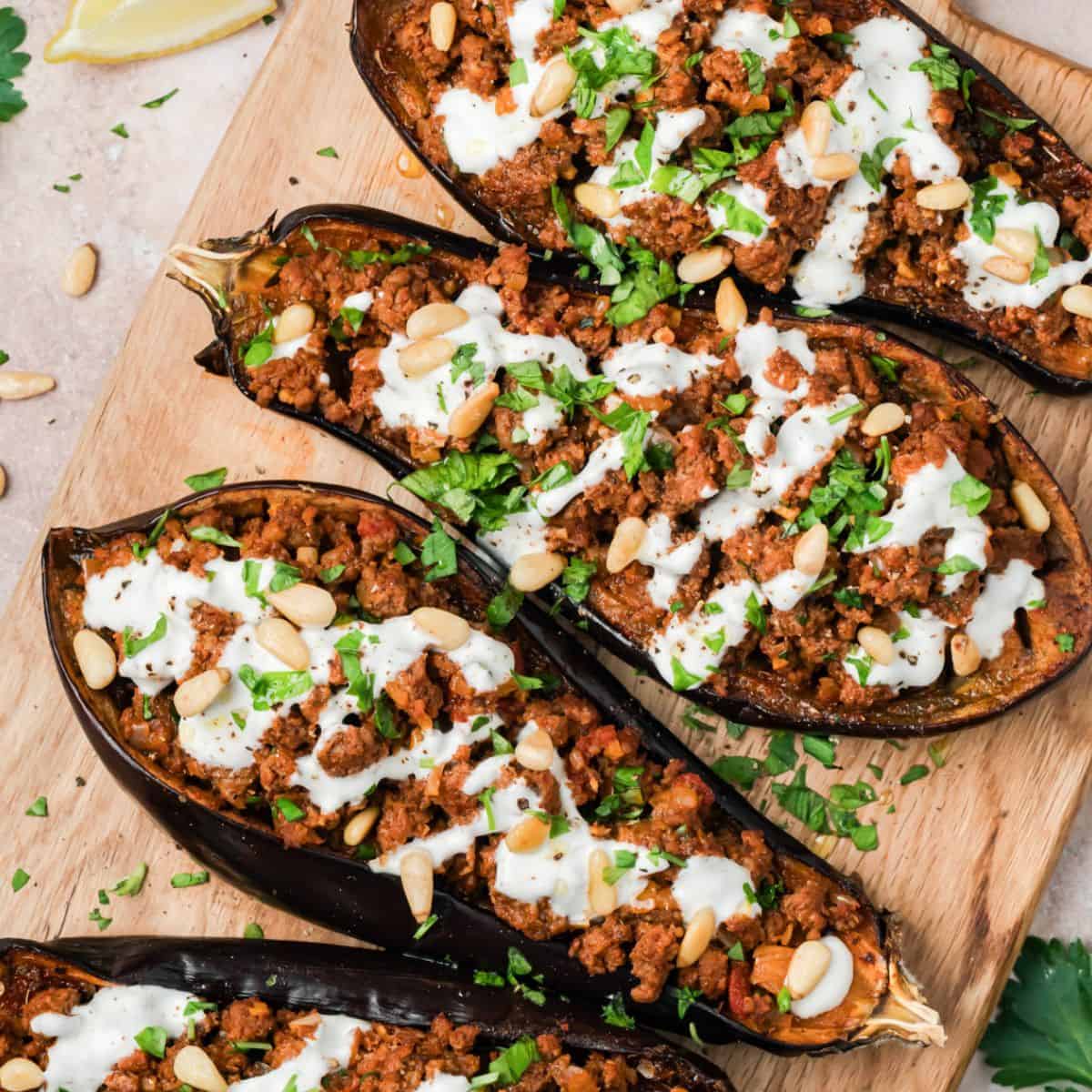 Mediterranean Stuffed Eggplant (with Garlic Yogurt Sauce)